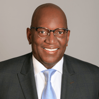 Ernest_Smiley Headshot 2025 square crop