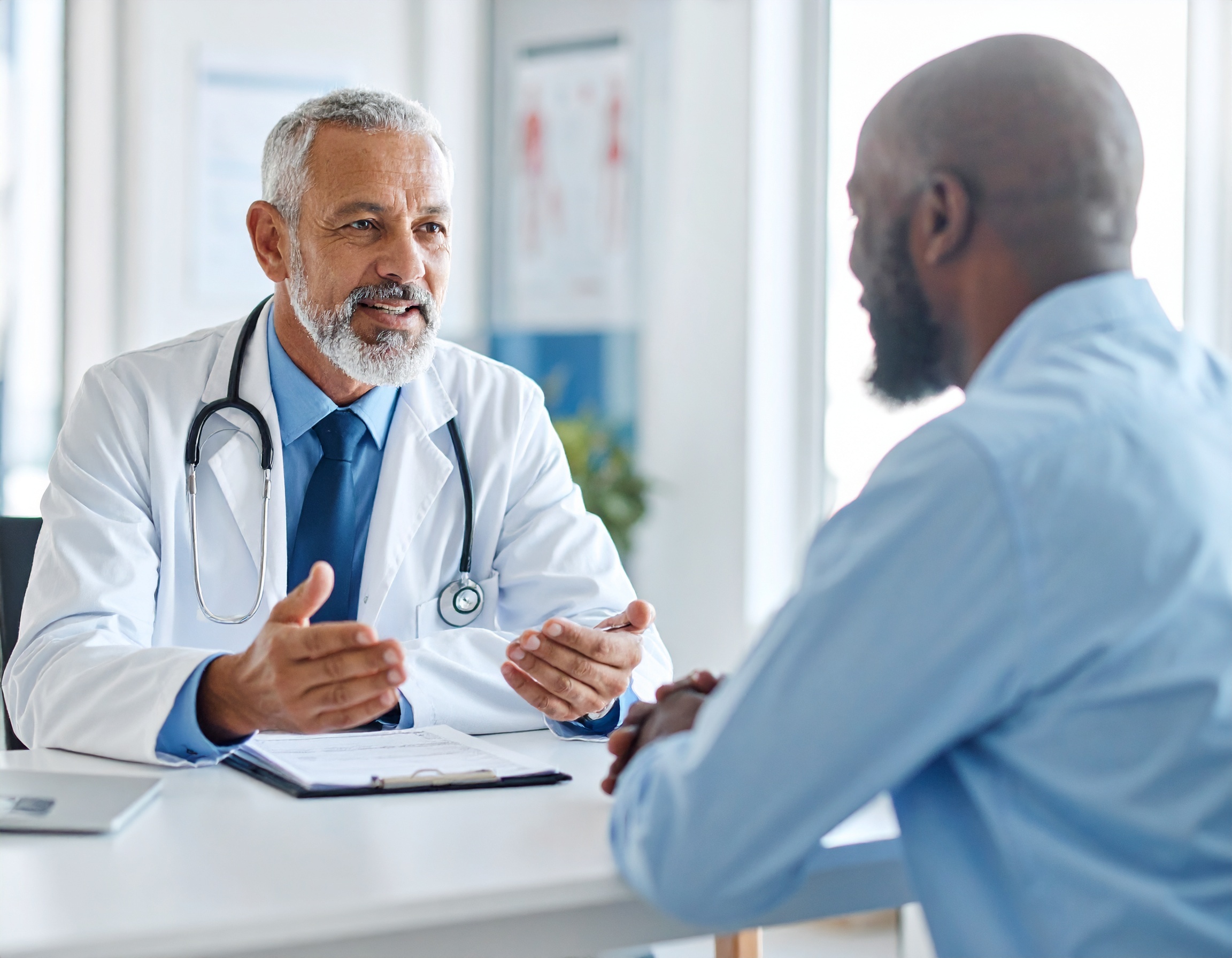 Firefly_Doctor and patient speaking or warm, relatable photo of an older adult. AFRICAN AMERI 546437